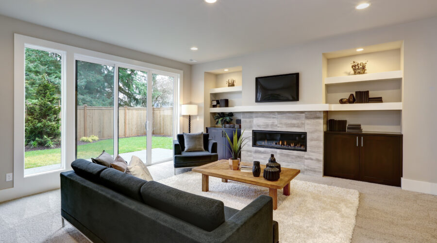 Beautiful modern living room interior with stone wall and firepl